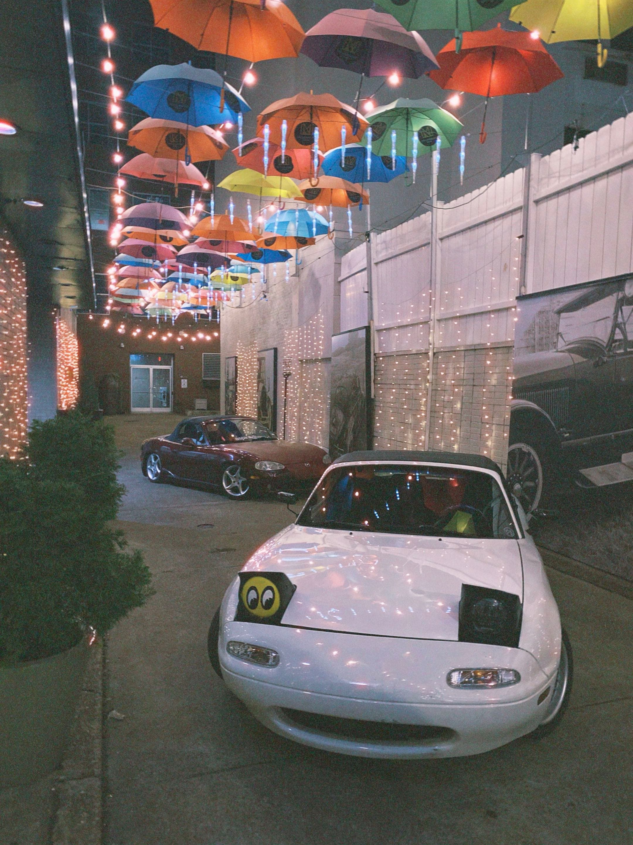 miatas under umbrellas