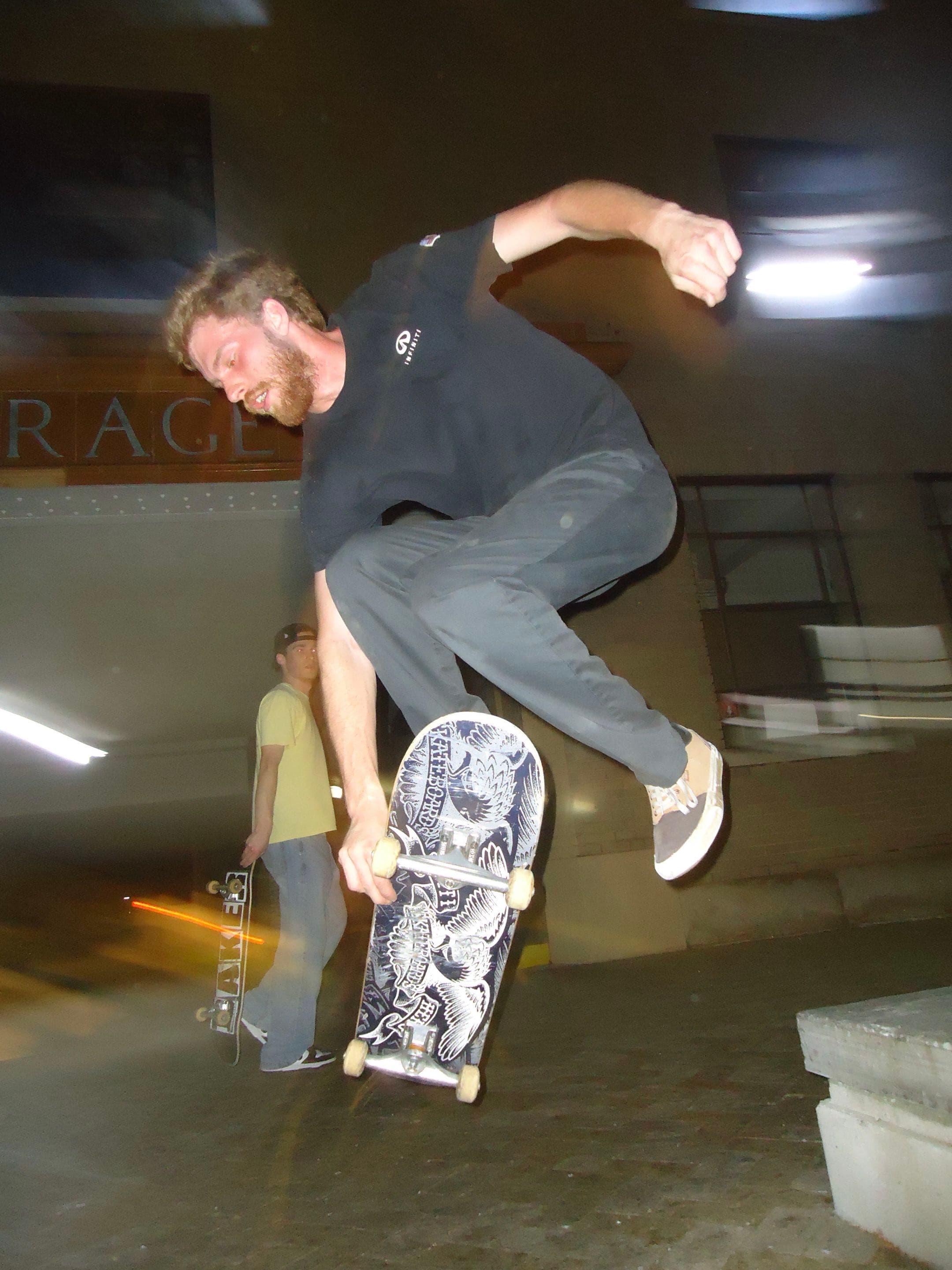 skateboarder mid flip