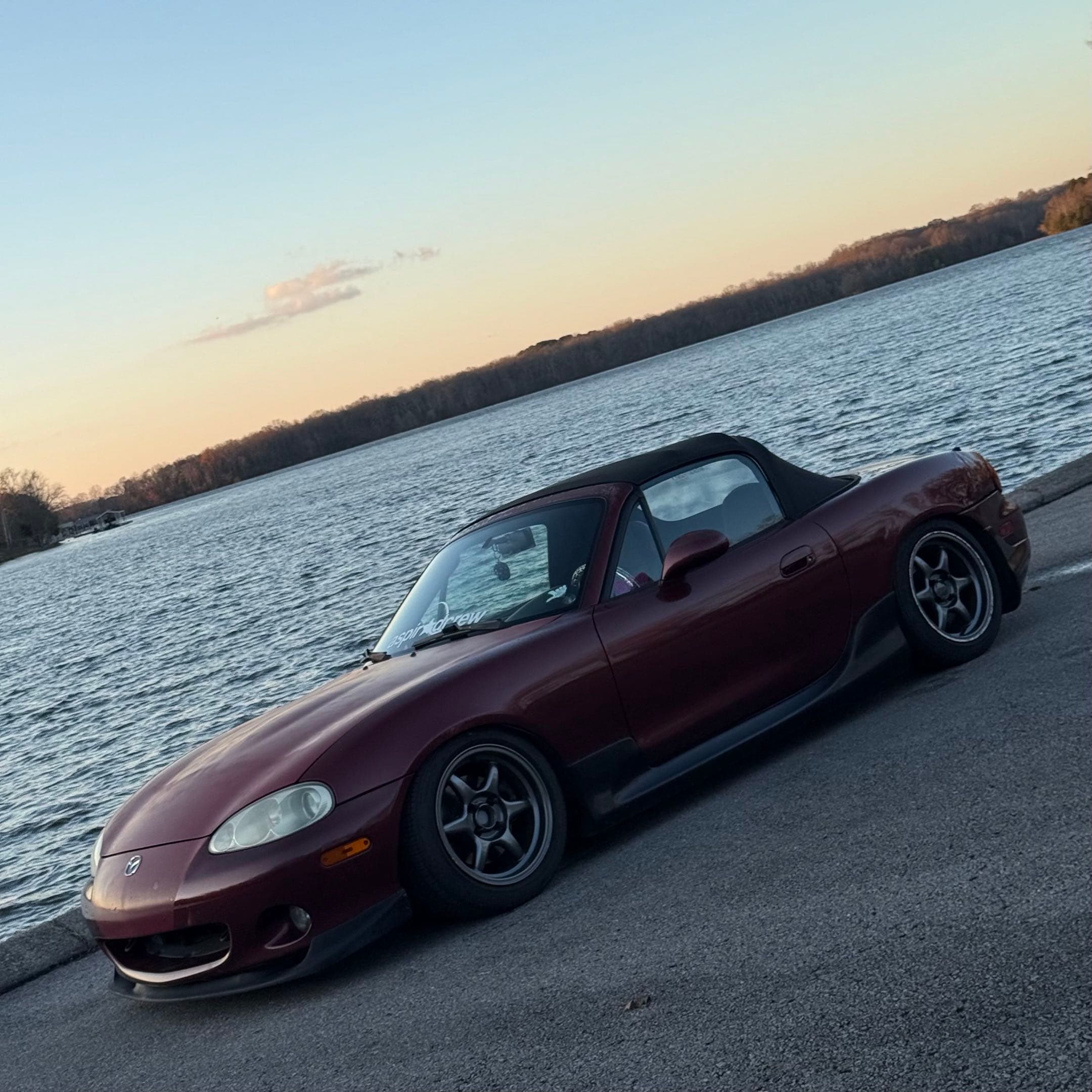 second iterated version of the miata. on kansei tandems, in front of a lake.